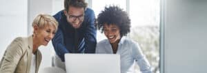 office employees looking at a computer